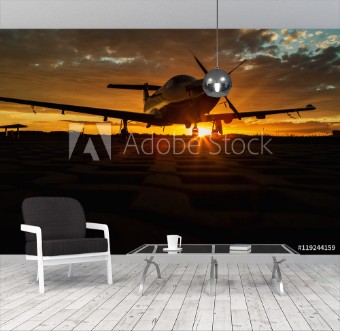 Picture of Single turboprop aircraft on runway at sunset time